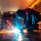 Welder fabricating a modular skid