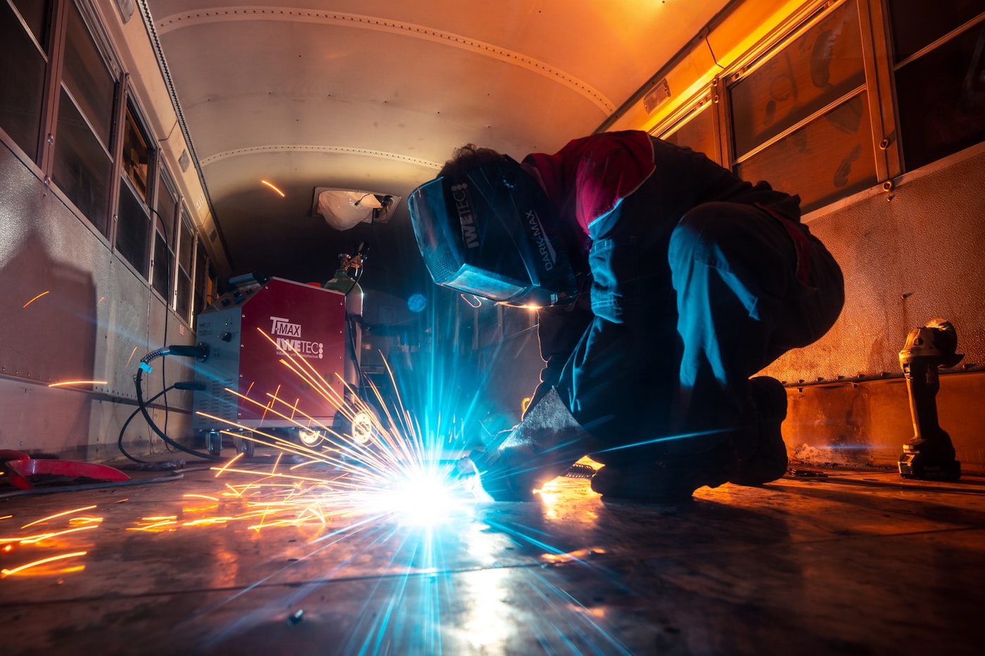Welder fabricating a modular skid